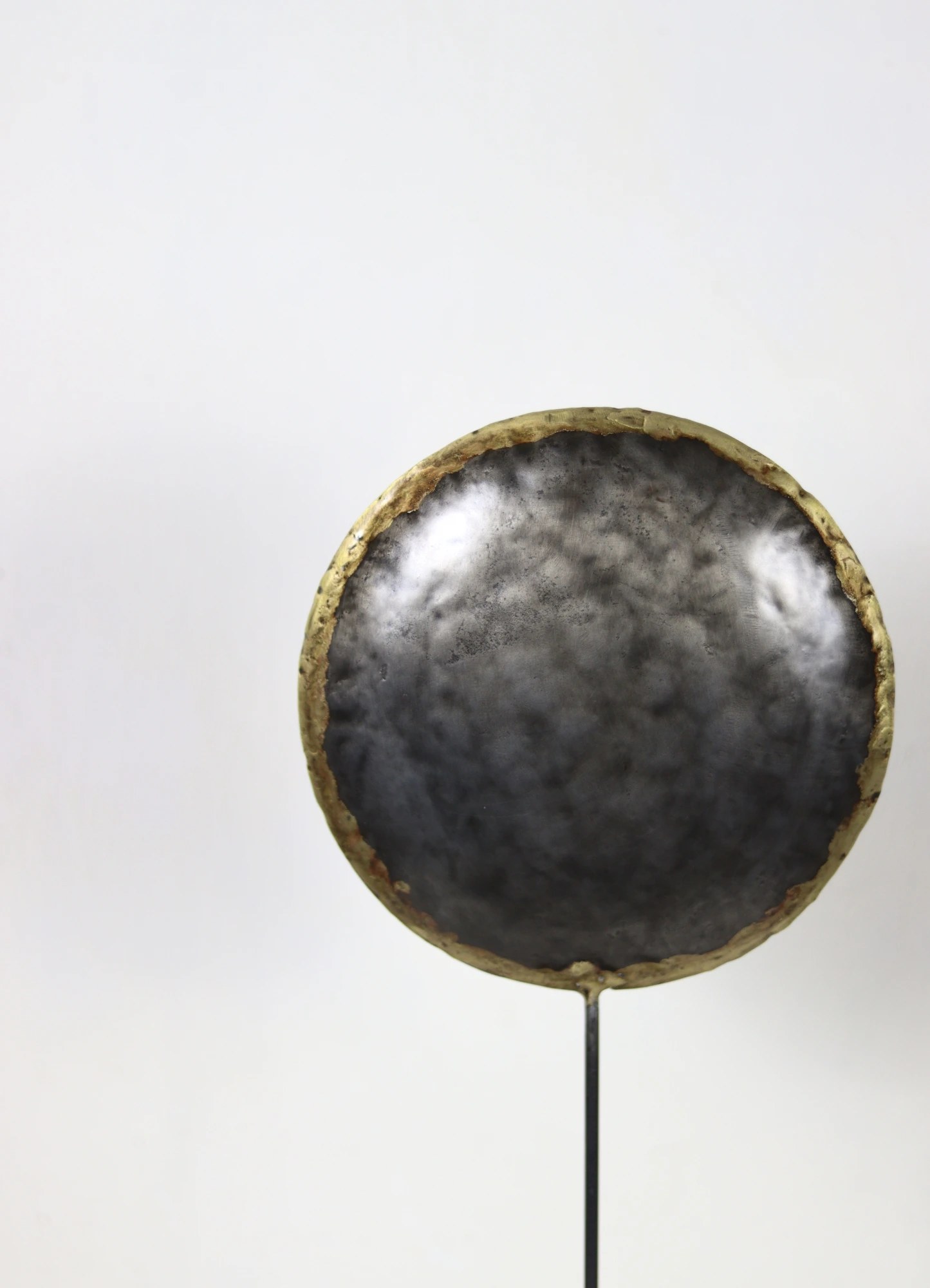 Cle and Co — disc sculpture on stand